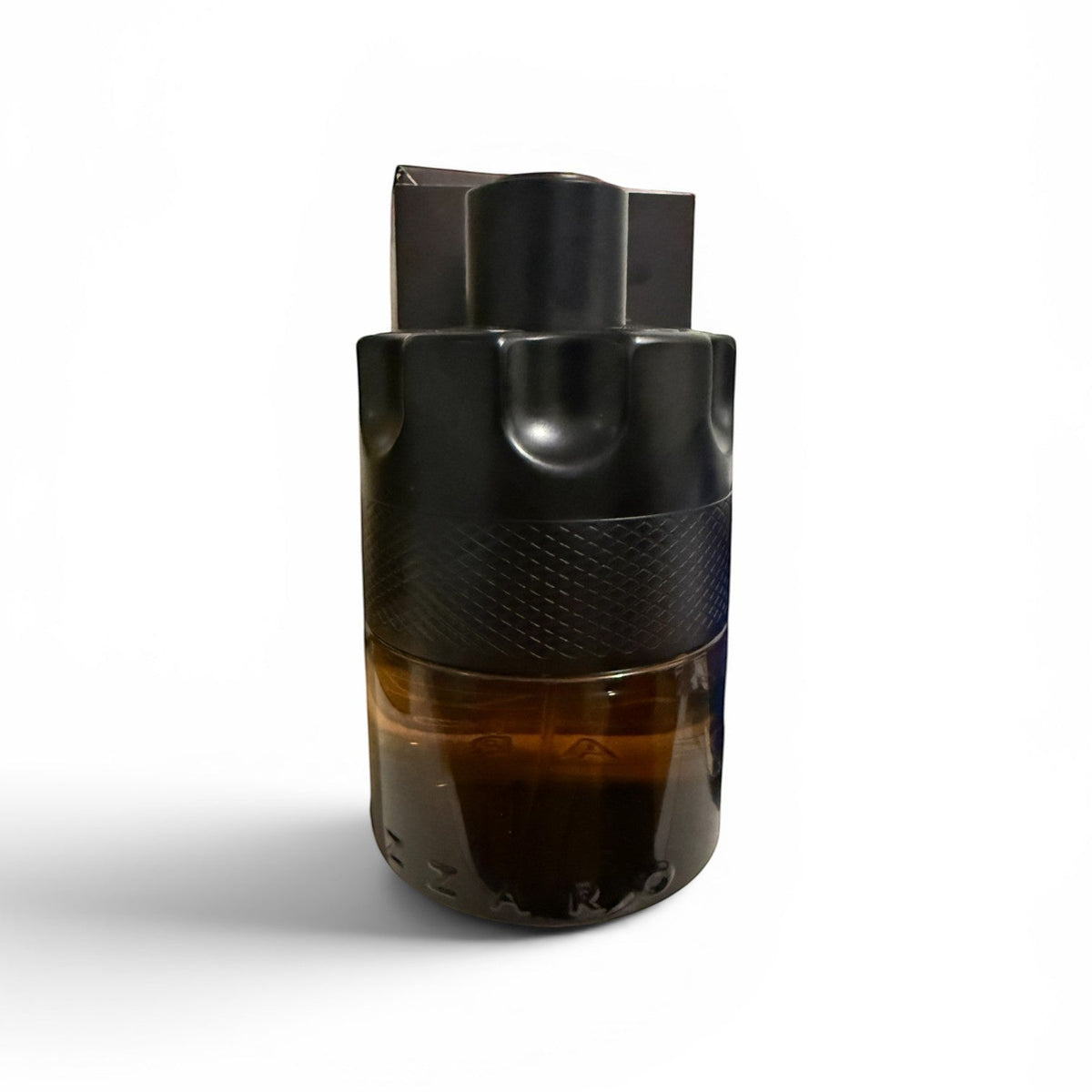 decantME Azzaro The Most Wanted Parfum decant in a dark glass bottle with a black revolver-style cap