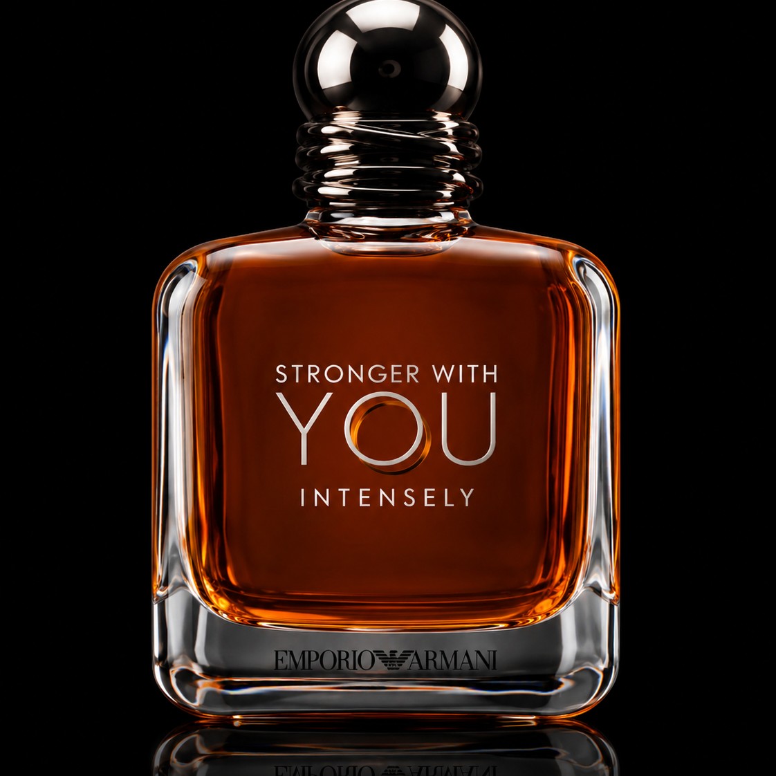 decantME Emporio Armani Stronger With You Intensely perfume bottle with amber liquid against a black background